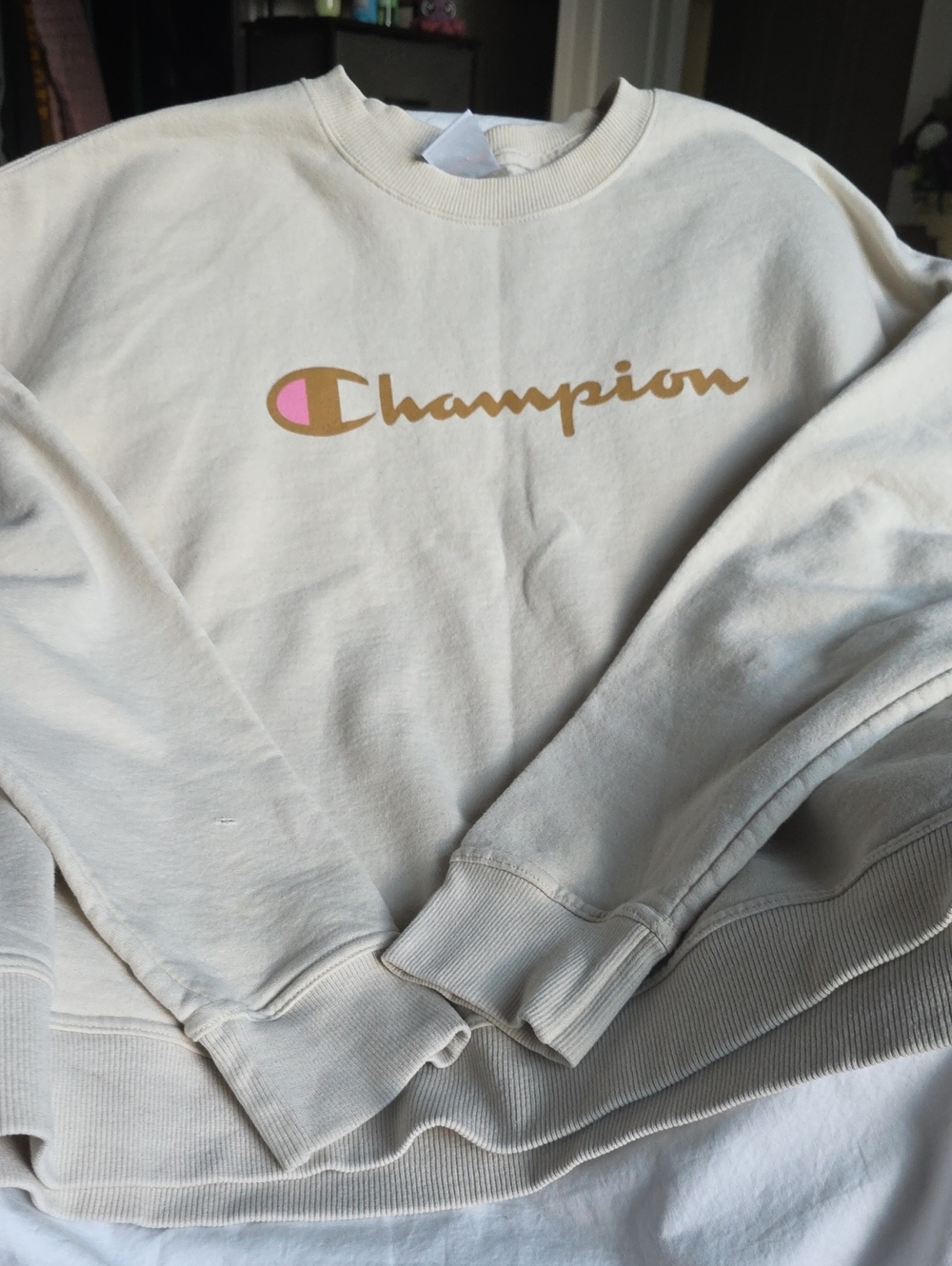 Champion Cream Crewneck Sweatshirt with Gold Script and Pink Accent